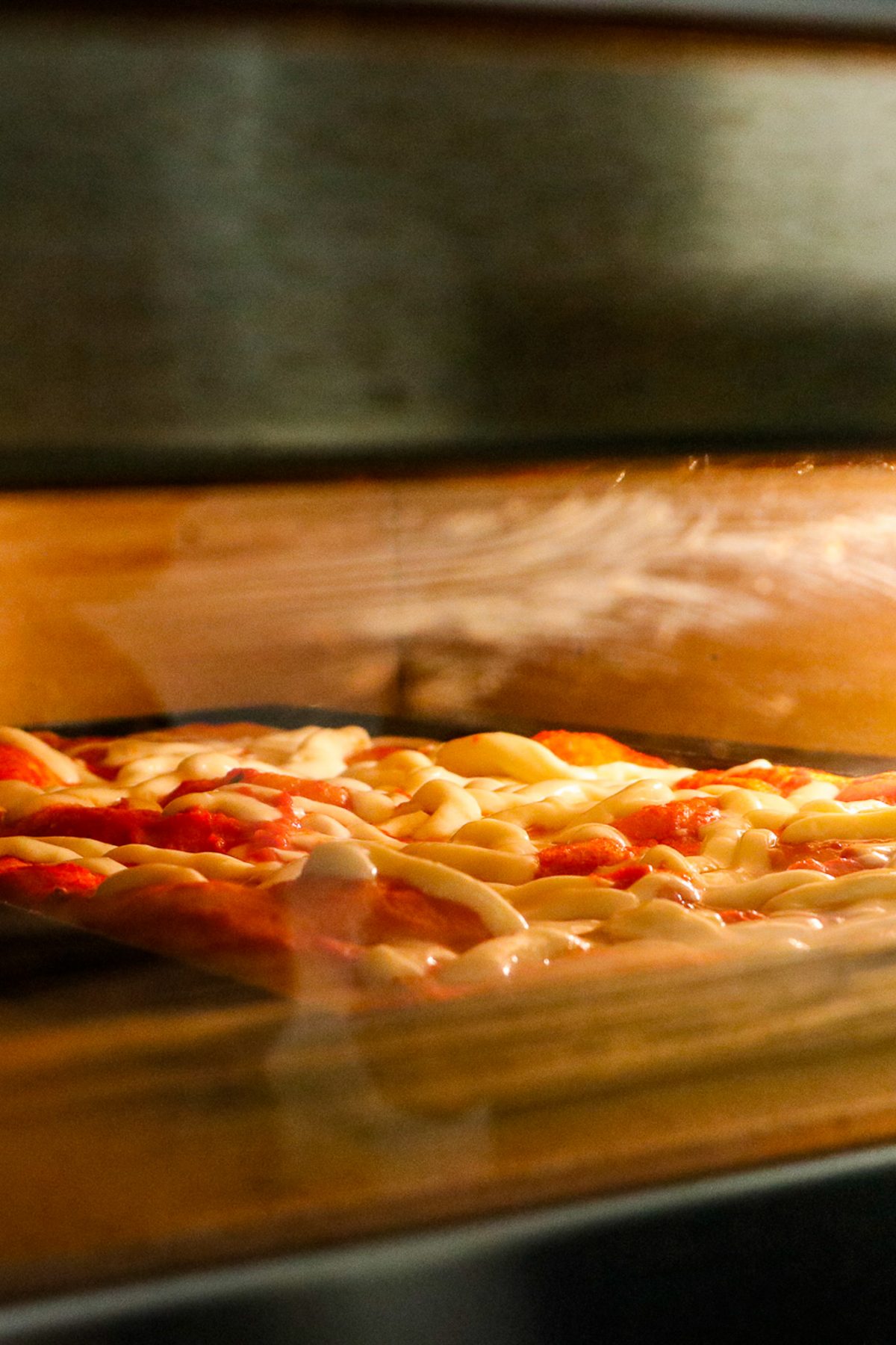 Cugini pizzeria spécialisée à Lyon, slices au four